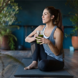 Chiropractic Boise ID Woman With Green Drink